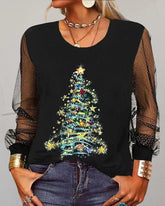 Topp med rund hals och julgranstryck